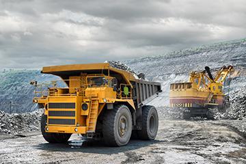 Loading of iron are on very big dump-body truck