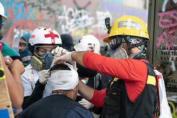 Protester wounded in his heard